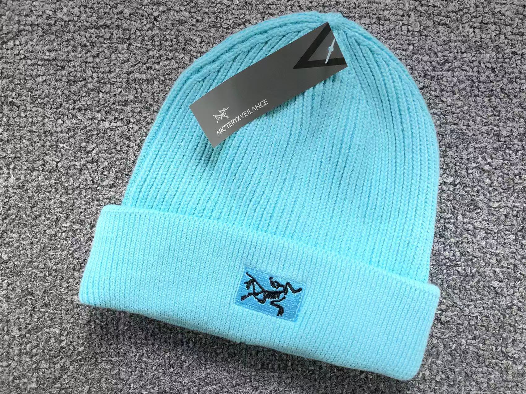Small Bird Logo Toque™