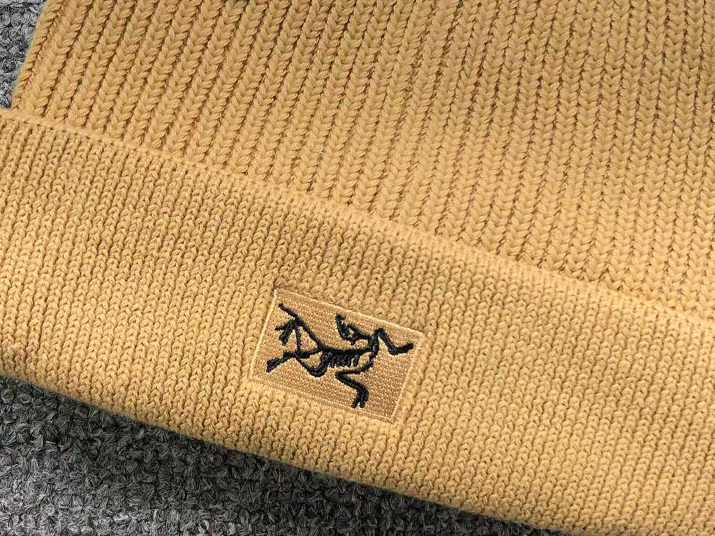 Small Bird Logo Toque™